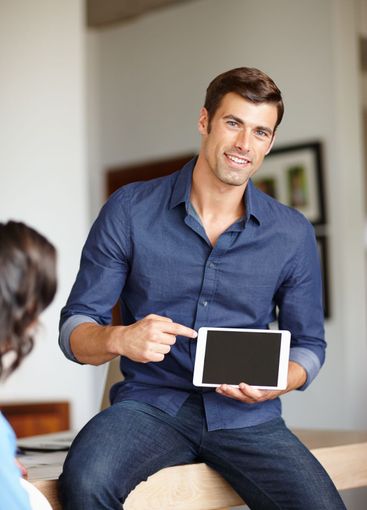 This will change your life. A handsome man pointing at...