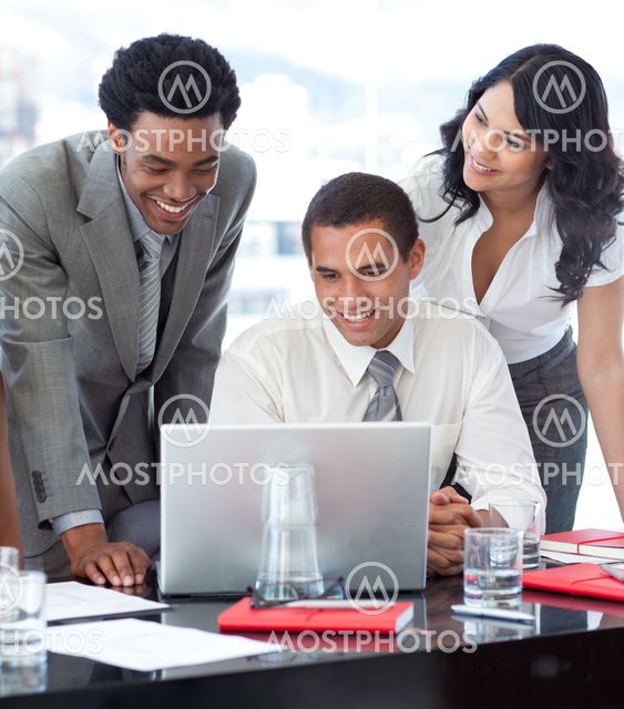 Businessmen and businesswoman working together