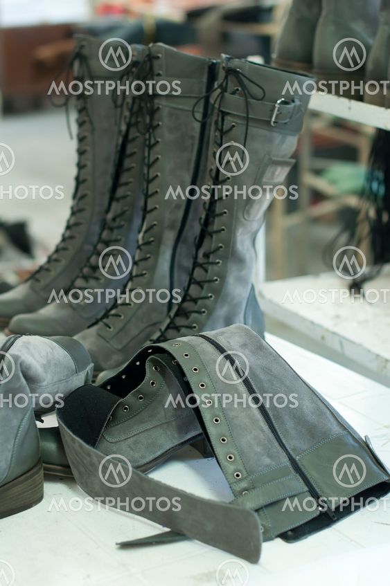 Boots arranged on shelves
