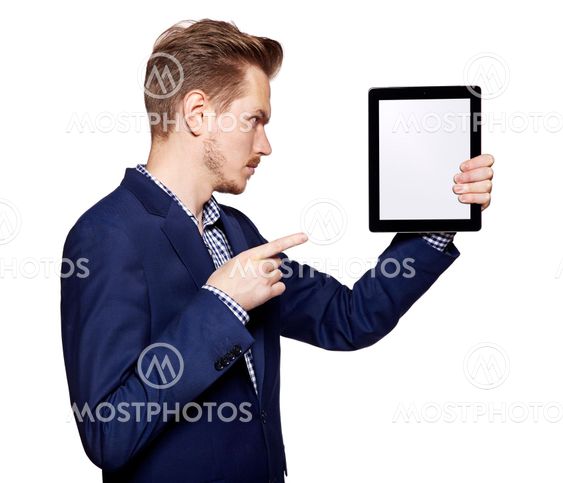 Young man pointing at tablet PC