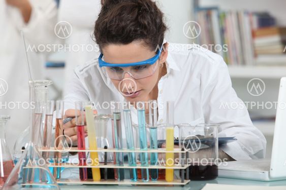 female scientist working in a lab