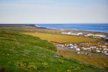 Scenic view of Vik village with ocean coast in Southern...