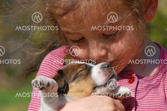 little girl and puppy