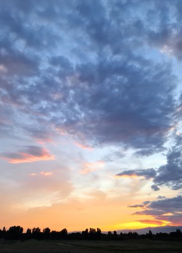 A stunning sunset paints the sky in vibrant shades of...