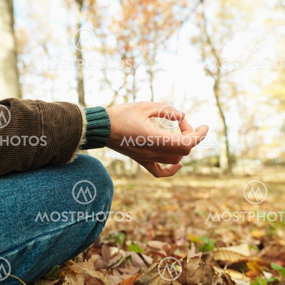 Caucasian man meditating.