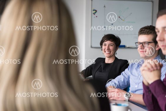 Group of young people meeting in startup office