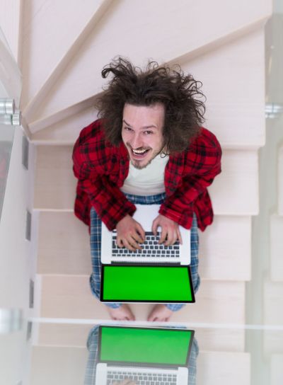 freelancer in bathrobe working from home