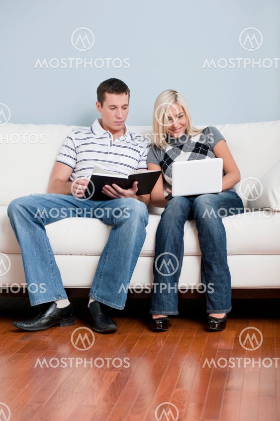 Couple Relaxing on Couch