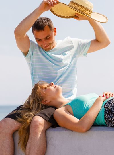 Man and woman sitting together outside