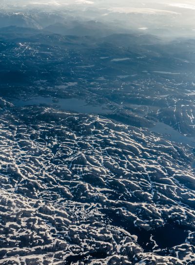 View from window of airplane flying over Norway...