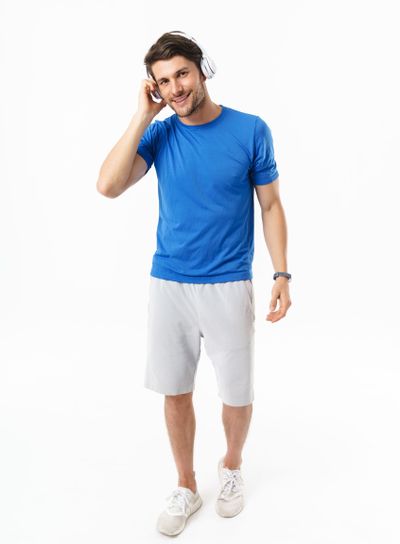 Full length photo of attractive man in casual t-shirt...