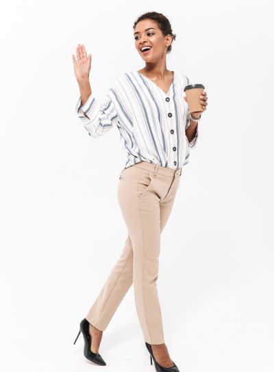 Full length portrait of a smiling young african...