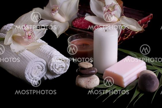 White orchids, spa products in wooden box