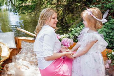 Sweet blonde girl having fun with her adorable mom...