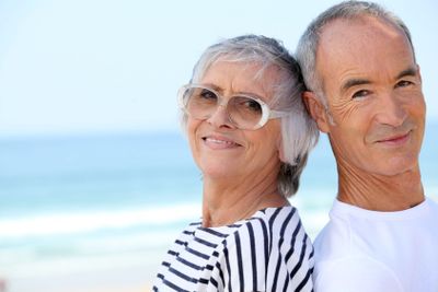 Elderly couple at the beach together