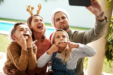 Family, playful and selfie for Christmas, bonding and...