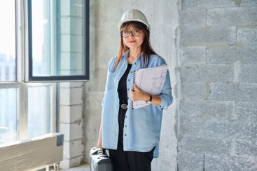 Portrait of female architect decorator of final...
