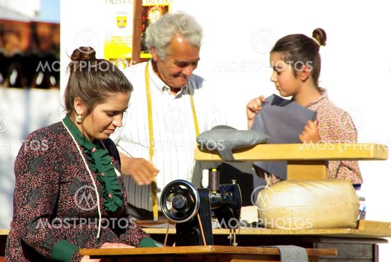 dressmaker and tailor working