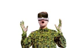 Double exposure. Man wearing virtual reality goggles. Forest. Trees.