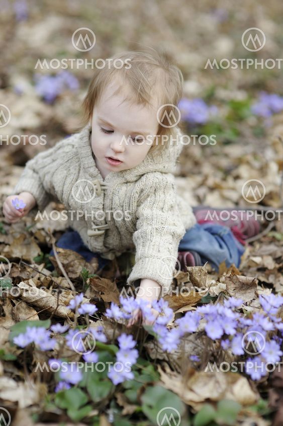 Little toddler girl at spring