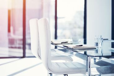 Notebook, chair and empty room of boardroom in office...