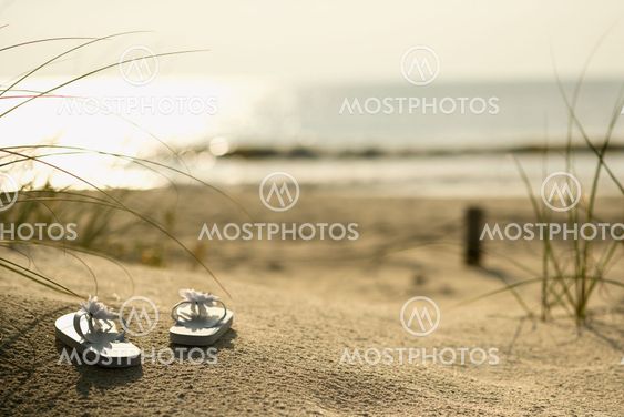Sandals on beach.