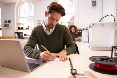 Designer Drawing Sketch In 3D Design Studio