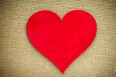 Heart isolated on a burlap fabric. Valentines Day and...