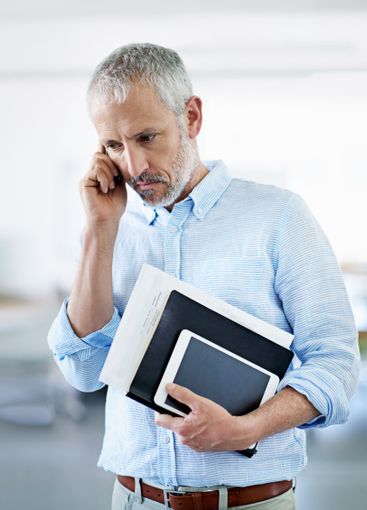 Phone call, tablet and mature business man in office for...