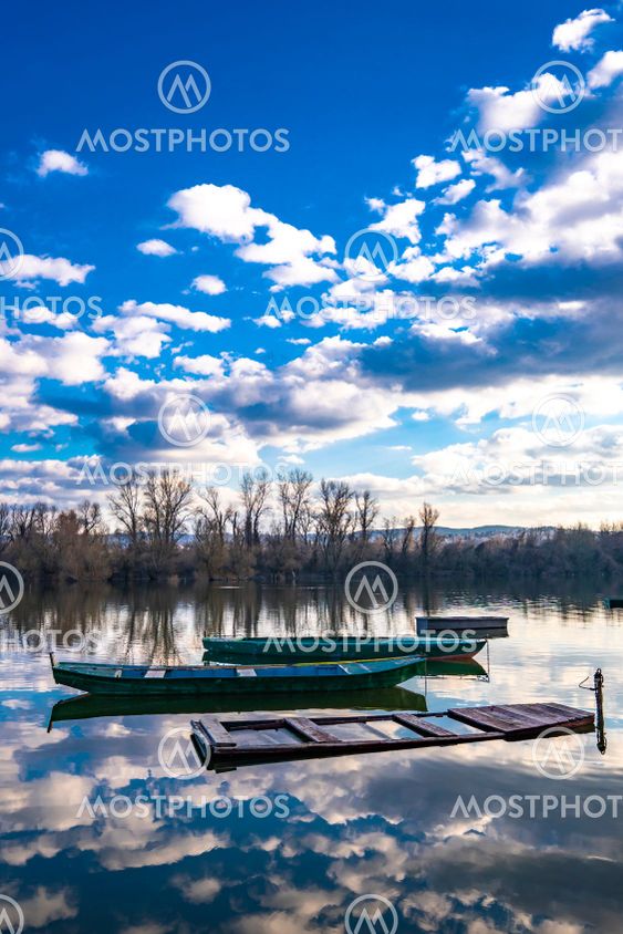Small boats on the calm lake
