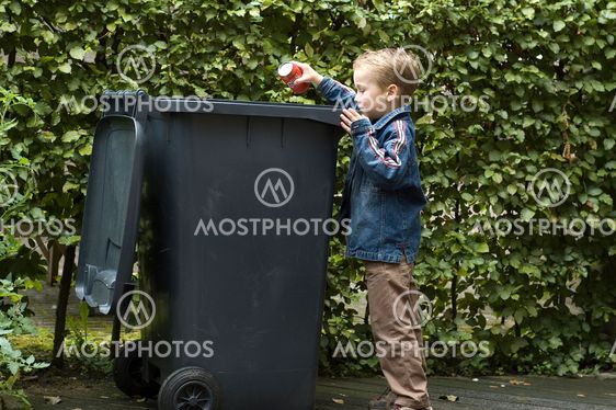 Boy Trashing A Can