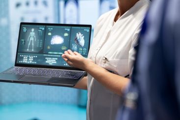 Medical staff analyzing heart x ray scan test results to...