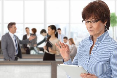 Office life businesswoman with tablet�