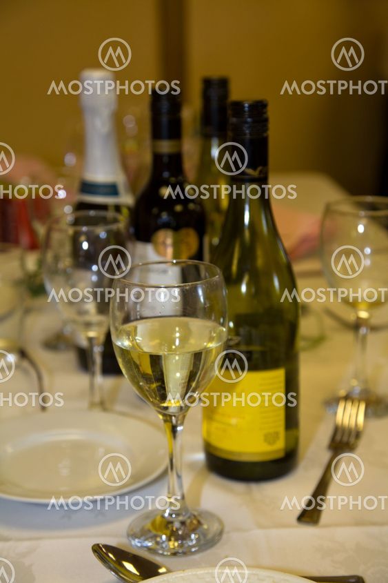 Wine bottles on table