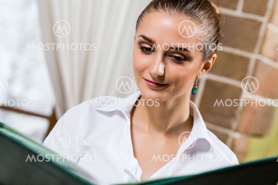 portrait of a nice lady at the restaurant