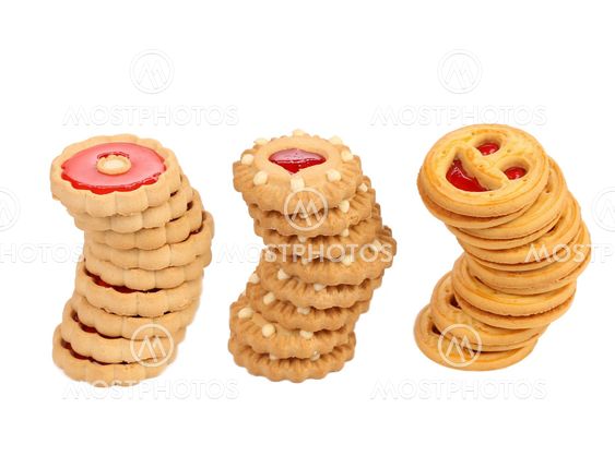 Three stacks of different biscuits.