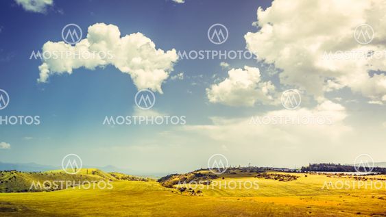 Green hills and blue sky