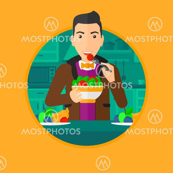 Man eating healthy vegetable salad.