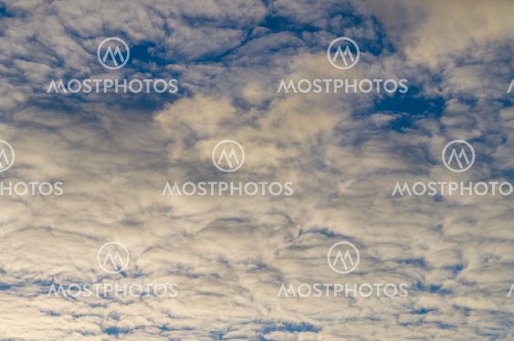 Stratocumulus clouds and the dark blue sky