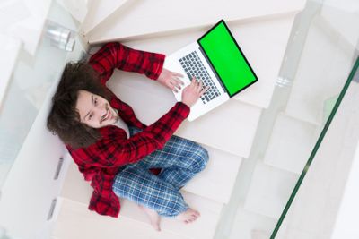 freelancer in bathrobe working from home