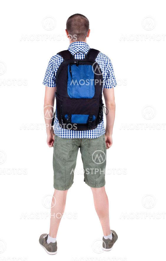 Back view of man with backpack looking up.