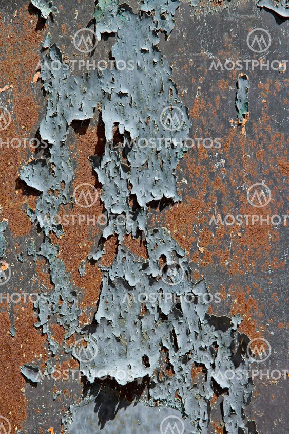 Paint scaled on rusty door