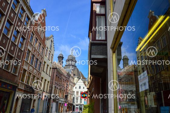Brussels, Belgium - April 2015: Preserved old European-style residential and commercial buildings on streets of Brussels City, Belgium