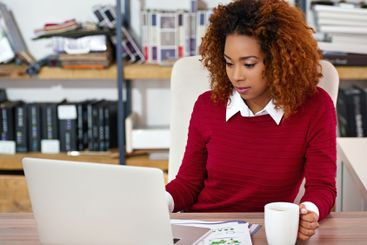 Office, creative and business woman on laptop for...