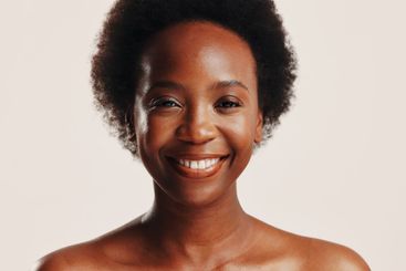 Beauty, happy and portrait of black woman in studio for...