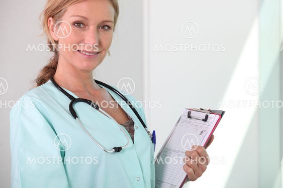 smiling female doctor with stethoscope