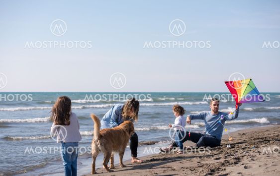 happy young family enjoying vecation during autumn day