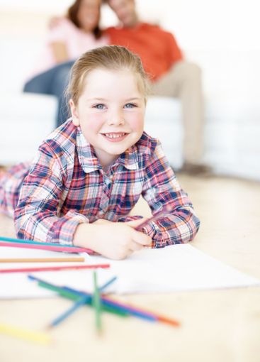 Drawing, color and portrait of child with paper in home...