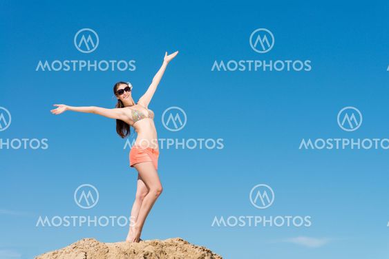 beautiful woman spread her arms
