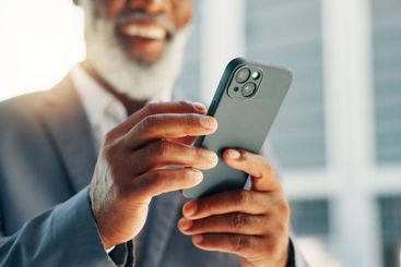 City, phone and hands of businessman typing for b2b...